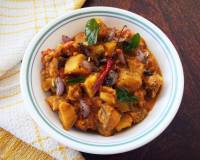 South Indian Vazhakkai Puli Kootu Recipe (Plantain In Tamarind Based Curry)