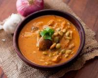 Karnataka Style Avarekalu Huli Saru Recipe (Field Beans in a Coconut based Gravy Recipe) 