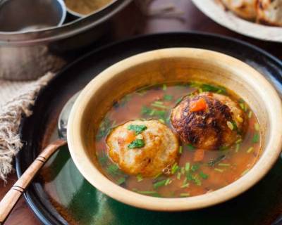 Karnataka Style Bonda Soup Recipe-Urad dal Fritters in Spicy Dal Soup 