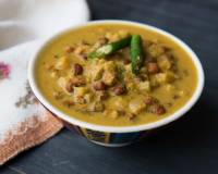 Kondakadalai Vazhathandu Puli Thengai Kuzhambu Recipe (Banana Stem Curry with Black Chickpeas Recipe)