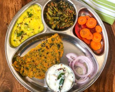 Portion Control Meal Plate: Gawar Phali Methi Sabzi, Dal, Carrot Thepla, Guava Raita Salad 