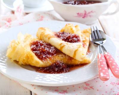 Madakasan Recipe - Coconut Filled Crepes with Berry Sauce