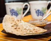 Onion Rava Dosa Recipe - Instant Crispy Sooji Dosa Recipe