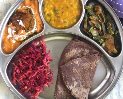 Portion Control Meal Plate: Stuffed Capsicum Makhani, Dal Tadka, Pyaz Wali Bhindi, Salad And Phulka
